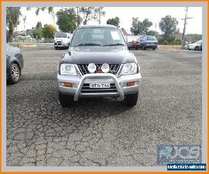 2002 Mitsubishi Triton MK GLS (4x4) Purple Manual 5sp M Dual Cab Utility