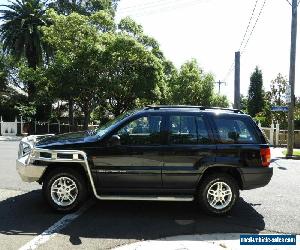 UP FOR SALE IS A 2003 JEEP GRAND CHEROKEE LAREDO 4X4 4.7 V8 PETROL/LPG