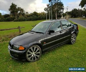 BMW 320i E46 Black sapphire paint. Full leather and woodgrain interior