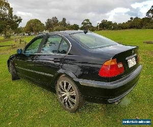 BMW 320i E46 Black sapphire paint. Full leather and woodgrain interior