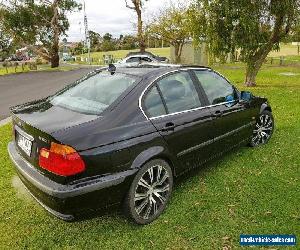 BMW 320i E46 Black sapphire paint. Full leather and woodgrain interior