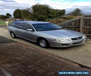 vz commodore 06 station wagon $900 ono may trade car, bike, trailer, cash.