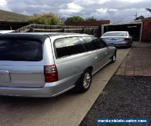 vz commodore 06 station wagon $900 ono may trade car, bike, trailer, cash.