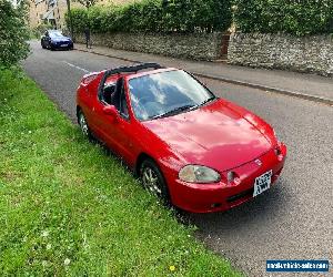 Red Honda CRX Del Sol Manual transmission and Transtop roof