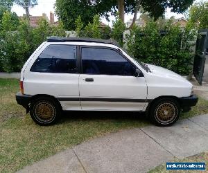 MAZDA 121 FUNTOP 1989 WITH ELECTRIC SUNROOF (VERY RARE)