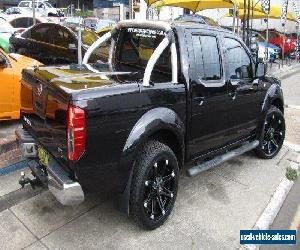 2011 Nissan Navara D40 ST (4x4) Black Manual 6sp M Dual Cab Pick-up