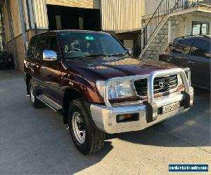 2000 Toyota Landcruiser FZJ105R GXL Red Automatic A Wagon