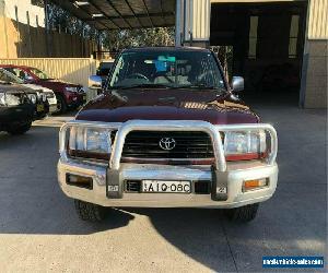 2000 Toyota Landcruiser FZJ105R GXL Red Automatic A Wagon