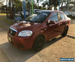 2009 Holden Barina TK Red Automatic A Sedan