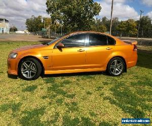 2009 Holden Commodore VE MY09.5 SV6 Gold / Orange 5 SP AUTOMATIC Sedan