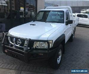 2011 Nissan Patrol MY11 Upgrade DX (4x4) White Manual 5sp M Cab Chassis