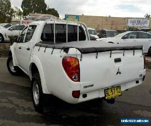 2011 Mitsubishi Triton MN MY11 GLX (4x4) Automatic 4sp A Double Cab Utility