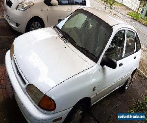 Ford Festiva GLi (1996) 5D Hatchback Auto