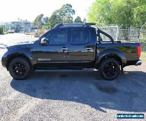 2009 Nissan Navara D40 Titanium Black Automatic 5sp A 4D UTILITY