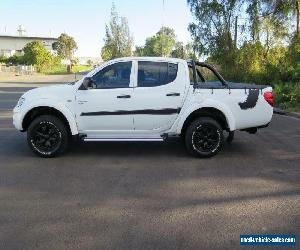 2012 Mitsubishi Triton MN MY12 GL-R White Automatic 4sp A 4D UTILITY