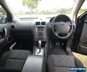 SEPTEMBER 2010 BLACK FORD TERRITORY 94000 Ks. SY MK11 TX 7 SEATER.