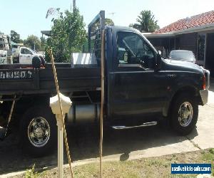 FORD F250 TIPPER,V8 AUTO/LPG PET/INJECTED 2003 MODEL