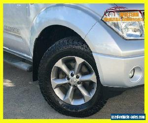 2009 Nissan Navara D40 Titanium Utility Dual Cab 4dr Auto 5sp 4x4 810kg 2.5DT A