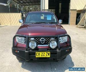 2007 Nissan Navara D40 ST-X Maroon Automatic A Utility