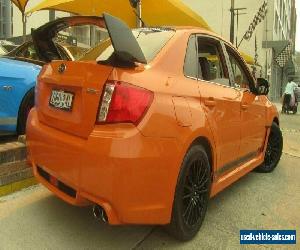 2012 Subaru WRX MY13 Club Spec (AWD) Orange Manual 5sp M Sedan