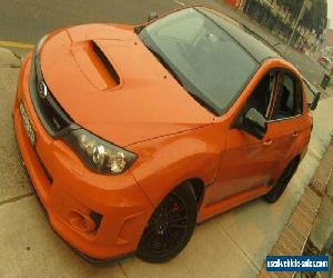 2012 Subaru WRX MY13 Club Spec (AWD) Orange Manual 5sp M Sedan