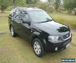 SEPTEMBER 2010 BLACK FORD TERRITORY 94000 Ks. SY MK11 TX 7 SEATER.