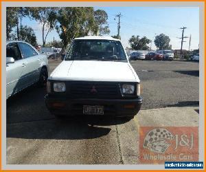 1993 Mitsubishi Triton MJ (4x4) White Manual 5sp M Dual Cab Utility