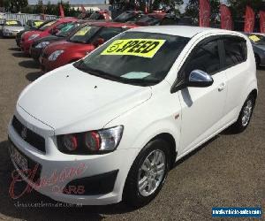 2012 Holden Barina TM MY13 CD White Manual 5sp M Hatchback