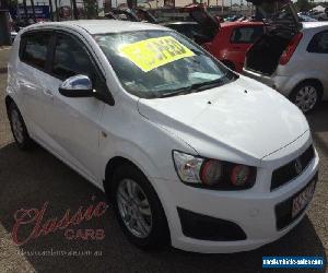 2012 Holden Barina TM MY13 CD White Manual 5sp M Hatchback