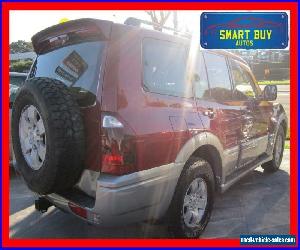 2003 Mitsubishi Pajero NP Exceed LWB (4x4) Red Automatic 5sp A Wagon