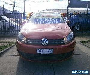 2009 Volkswagen Golf 1K 6TH GEN 103 TDI Comfortline Red Automatic 6sp A