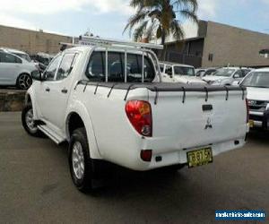 2014 Mitsubishi Triton MN MY14 Update GLX (4x4) White Automatic 4sp A