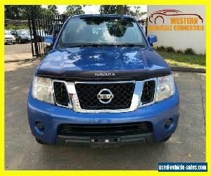 2013 Nissan Navara D40 S6 ST Utility Dual Cab 4dr Man 6sp 4x4 808kg 2.5DT Blue