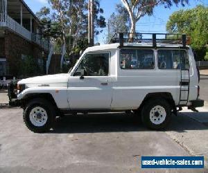 2006 Toyota Landcruiser HZJ78R (4x4) 11 Seat White Manual 5sp M TroopCarrier