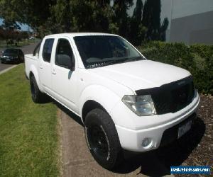 2009 Nissan Navara D40 ST (4x4) White Manual 6sp M Dual Cab Pick-up