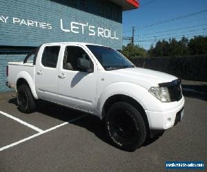 2009 Nissan Navara D40 ST (4x4) White Manual 6sp M Dual Cab Pick-up