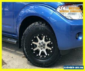 2013 Nissan Navara D40 S6 ST Utility Dual Cab 4dr Man 6sp 4x4 808kg 2.5DT Blue