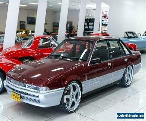 1986 Holden Commodore VL SL Burgundy Manual 5sp M Sedan for Sale