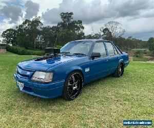 1985 Holden Commodore VK SL Sedan 4dr Auto 3sp 5.0 Blue Automatic A Sedan