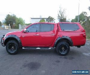 2009 Mitsubishi Triton MN MY10 GLX-R Red Manual 5sp M 4D UTILITY