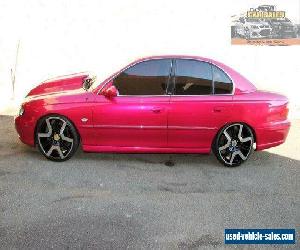 2002 Holden Calais VX Pink Automatic 4sp A Sedan