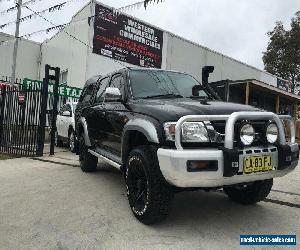 2004 Toyota Hilux KZN165R SR5 (4x4) Black Manual 5sp M Dual Cab Pick-up