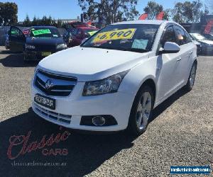 2009 Holden Cruze JG CDX White Manual 5sp M Sedan