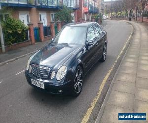 2005 BLACK CLASSIC MERCEDES AUTO 2.1 L CDI WITH LEATHER SEATS