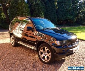 BMW X5 4.4i midnight black metallic 