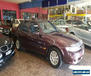 1994 Ford Fairmont EF Ghia Bordeaux Automatic 4sp A Sedan