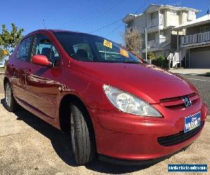 2005 Peugeot 307 MY06 Upgrade XSE HDI 2.0 Burgundy Metallic Manual 6sp M