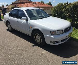 Nissan Maxima, 1997 V6 Auto, PEARL WHITE, (MOTOR HAS CRACKED HEAD & WON'T RUN)