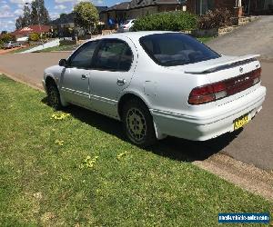 Nissan Maxima, 1997 V6 Auto, PEARL WHITE, (MOTOR HAS CRACKED HEAD & WON'T RUN)