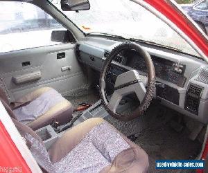 HOLDEN  COMMODORE RED VL SEDAN RB30 AUTO NICE CAR FOR ITS AGE. NEEDS A POLISH 